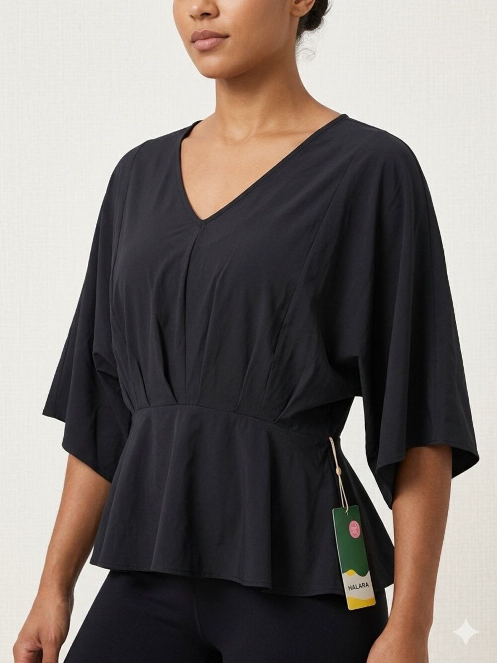 64. HALARA Black V-Neck Peplum Tunic Top